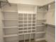 Walk-in closet with built-in shelving for organized storage at 5207 86Th Street W Ct, Bradenton, FL 34210