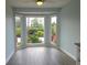 Bright dining area featuring a bay window with a view of the lush landscaping at 5207 86Th Street W Ct, Bradenton, FL 34210