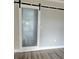The frosted sliding door is a unique feature at 5207 86Th Street W Ct, Bradenton, FL 34210