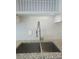 Close up of the sink area with stainless steel sink, goose neck faucet and subway tile backsplash at 5207 86Th Street W Ct, Bradenton, FL 34210