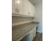 This office nook has granite countertops, updated cabinets, and plenty of outlets at 5207 86Th Street W Ct, Bradenton, FL 34210