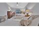 Well-lit bedroom with a ceiling fan, neutral tones, and tasteful decor at 5695 Palmer Cir # 203, Bradenton, FL 34211