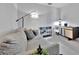 Comfortable living room with a cozy sofa, modern desk, and stylish decor at 5695 Palmer Cir # 203, Bradenton, FL 34211