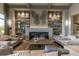 Modern lounge area features a stunning fireplace, elegant decor, and comfortable seating arrangements at 5695 Palmer Cir # 203, Bradenton, FL 34211