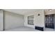 Cozy patio with tiled flooring, neutral wall, and bench seating area at 5695 Palmer Cir # 203, Bradenton, FL 34211