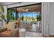 Outdoor patio featuring a dining table and chairs with views of a meticulously kept backyard at 5866 Cavano Dr, Sarasota, FL 34231