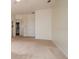 Spacious bedroom with neutral carpeting and a large closet at 5897 Carriage Dr, Sarasota, FL 34243