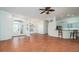 Bright living room showcasing tile floors, and an open floor plan to the Kitchen at 5897 Carriage Dr, Sarasota, FL 34243
