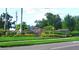 Stone sign marking the entrance to Covered Bridge Estates at 6107 French Creek Ct, Ellenton, FL 34222