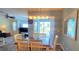 Cozy dining area with views of the pool and easy access to the living space, great for entertaining at 6107 French Creek Ct, Ellenton, FL 34222
