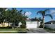 Charming single-story home with a well-manicured lawn and two-car garage at 6107 French Creek Ct, Ellenton, FL 34222