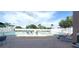 Large outdoor swimming pool with plenty of lounge chairs and clear blue water for relaxing at 6107 French Creek Ct, Ellenton, FL 34222