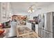 Bright kitchen with stainless steel appliances and plenty of cabinet space at 619 Albee Farm N Rd, Nokomis, FL 34275