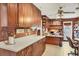 Spacious home office with custom cabinetry and built-in desk, offering plenty of workspace and storage at 619 Albee Farm N Rd, Nokomis, FL 34275