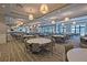 Large community dining area featuring ample seating arrangements and abundant natural light at 6791 Alstead Cir, Bradenton, FL 34202