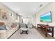 Inviting living room featuring a comfortable sofa, stylish decor, and an open floor plan at 6791 Alstead Cir, Bradenton, FL 34202