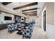 Cozy lounge area with comfortable seating, bookshelves, and TVs for residents to relax and socialize at 6791 Alstead Cir, Bradenton, FL 34202