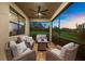 This cozy screened patio with comfortable seating offers a tranquil view at 6791 Alstead Cir, Bradenton, FL 34202