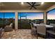 This screened patio offers beautiful lake views and outdoor dining at 6791 Alstead Cir, Bradenton, FL 34202