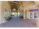 Covered walkway with retail stores including Island Fresh, offering shopping and pedestrian access at 6804 19Th W Ave, Bradenton, FL 34209