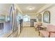 Bright kitchen features stainless steel appliances, granite counters, and two chairs with a small table at 6804 19Th W Ave, Bradenton, FL 34209