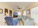 Bright sunroom living area, featuring comfortable seating, tile floors, and lots of natural light at 6804 19Th W Ave, Bradenton, FL 34209