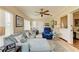 Sunroom living area with tile flooring and comfortable furnishings, filled with natural light at 6804 19Th W Ave, Bradenton, FL 34209