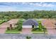 Birds-eye view showing the home's location in a community with mature trees and well-kept lawns at 7119 67Th E Ter, Bradenton, FL 34203