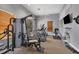 Fitness center featuring exercise equipment, natural light, and television at 7119 67Th E Ter, Bradenton, FL 34203