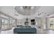 Open clubhouse living area with tile floors, comfortable seating, and a modern design at 7119 67Th E Ter, Bradenton, FL 34203