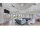 Inviting living room space in the community clubhouse with stylish decor and comfortable furniture at 7119 67Th E Ter, Bradenton, FL 34203