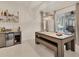 Entertainment area features a wet bar, a pool table, and easy access to the backyard at 7119 67Th E Ter, Bradenton, FL 34203