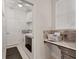 Well-lit laundry room with washer, dryer, storage, and countertop space at 7119 67Th E Ter, Bradenton, FL 34203