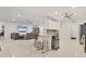 Bright, open concept living space connecting kitchen and living room, perfect for modern living at 7119 67Th E Ter, Bradenton, FL 34203