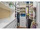 Organized walk-in closet with shelving, drawers, and ample storage space for clothing and accessories at 7325 Skybird Rd # 399, Bradenton, FL 34209