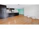 Open concept kitchen with dark cabinets, quartz countertops, and stainless steel appliances at 7355 Cass Cir, Sarasota, FL 34231