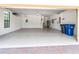 Spacious two-car garage with ample storage space and natural light at 7542 Windy Hill Cv, Bradenton, FL 34202