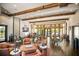 Elegant clubhouse featuring comfortable seating, large windows, and stylish decor at 8291 Varenna Dr, Sarasota, FL 34231