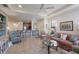 The open-concept living room provides a seamless flow between the kitchen and living spaces at 8291 Varenna Dr, Sarasota, FL 34231