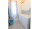 Clean and functional laundry area with modern washer, dryer, and ample storage space at 831 Palmetto Ne Dr, Port Charlotte, FL 33952