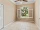 Bright bedroom with shuttered windows offering a view of the well-kept exterior landscaping at 866 Oak Briar Ln, Osprey, FL 34229