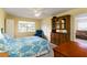 Comfortable bedroom with ample natural light and stylish furniture, creating a cozy and inviting space at 9412 Concord Cir, Bradenton, FL 34210