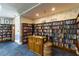 Community library featuring floor-to-ceiling bookshelves stocked with a wide variety of books at 9412 Concord Cir, Bradenton, FL 34210