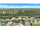 Neighborhood aerial view features well-maintained homes with mature trees and lush landscaping in a serene environment at 1126 Barclay Wood Dr, Ruskin, FL 33570