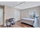 A cozy bedroom featuring a desk and a closet at 1126 Barclay Wood Dr, Ruskin, FL 33570