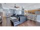 Open-concept living room with hardwood floors and easy access to kitchen and dining at 1126 Barclay Wood Dr, Ruskin, FL 33570