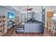 Open-concept living room with hardwood floors and easy access to kitchen and entry at 1126 Barclay Wood Dr, Ruskin, FL 33570