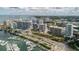 Beautiful aerial showcasing the waterfront condos, marina, and city at 1255 N Gulfstream Ave # 1104, Sarasota, FL 34236