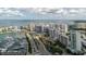 Fantastic aerial captures cityscape, waterfront, and surrounding areas, showing city's allure and prime location at 1255 N Gulfstream Ave # 1104, Sarasota, FL 34236