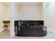 Spacious bathtub with black tile surround, modern fixtures, and plenty of room for relaxation in this home at 1255 N Gulfstream Ave # 1104, Sarasota, FL 34236